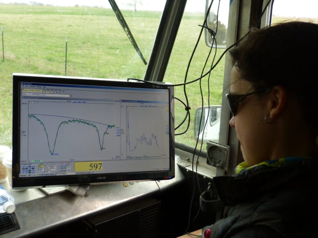 Tara Yacovitch observing atmospheric ethane readings in the Aerodyne Mobile Lab van. Image Credit: Gabrielle PÌ©tron, NOAA