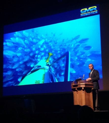 During the Sept. 20, 2016 plenary session at Oceans ’16, Jim Bellingham discusses the work of one scientist to capture a view of the ocean rarely seen – a backwards glance from a camera affixed to the top of an autonomous underwater vehicle. Image Credit: Kelley Christensen