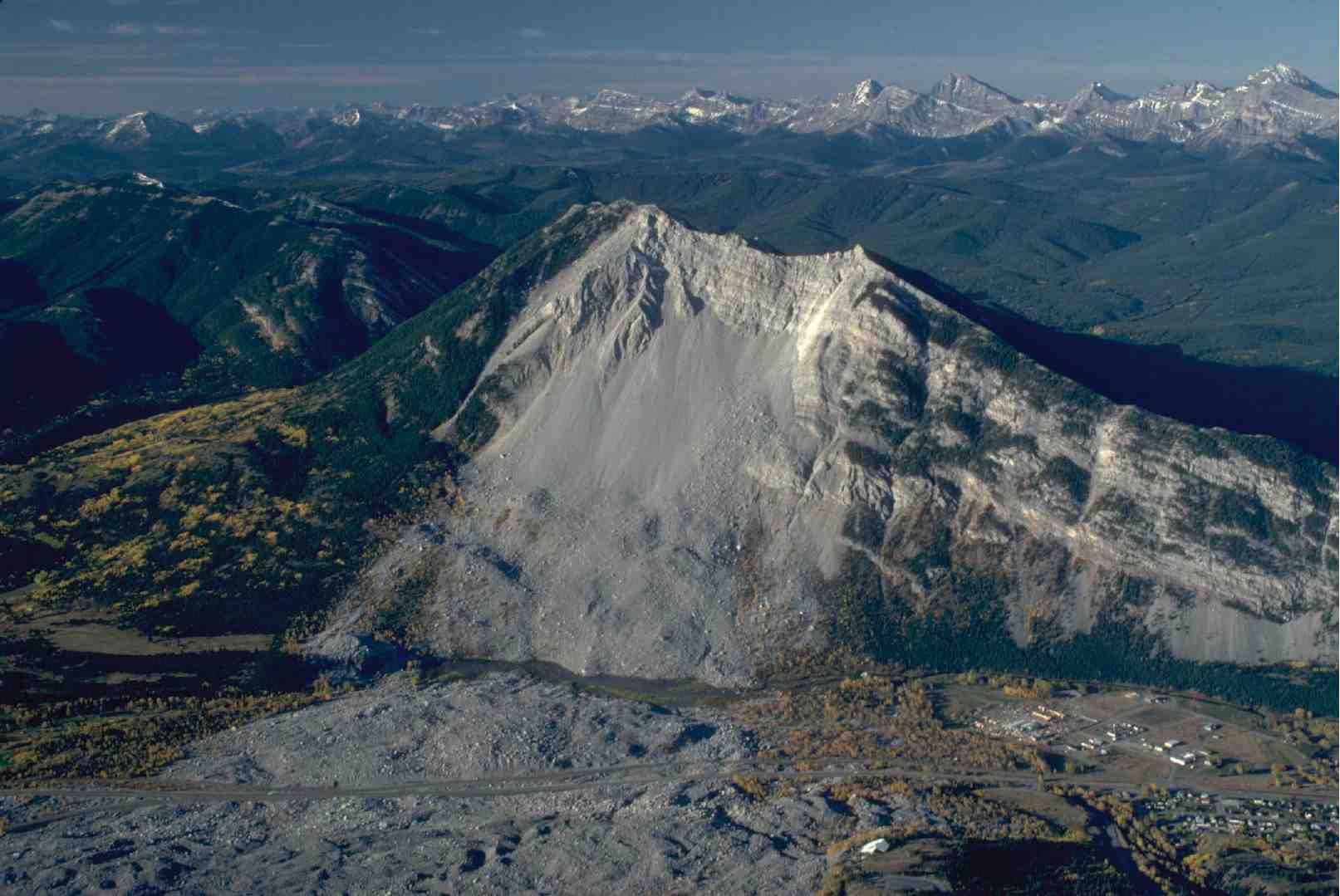 Image of mountainside in Alberta Canada exhibiting landslide and soil instability.