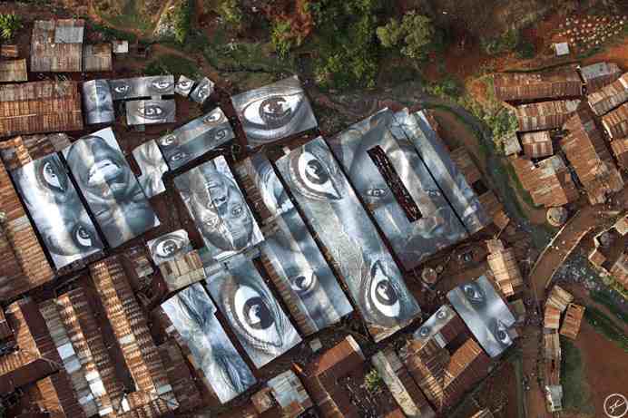 The roofs of Kibera in Nairobi, Kenya. (JR ÛÒ Kenya aerial photography. 2009 Recommended Reading, Inc. User-generated content is licensed under a Creative Commons Public Domain license.)