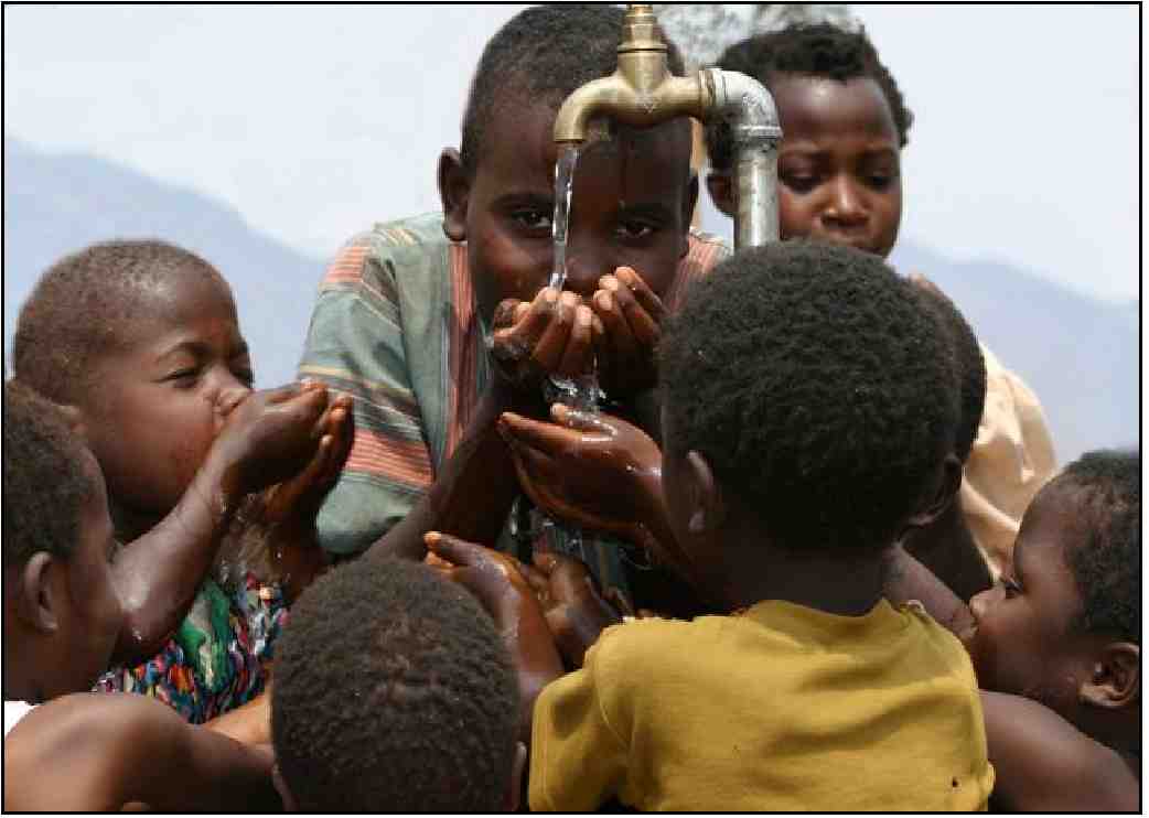 Image of children drinking water from a faucet.