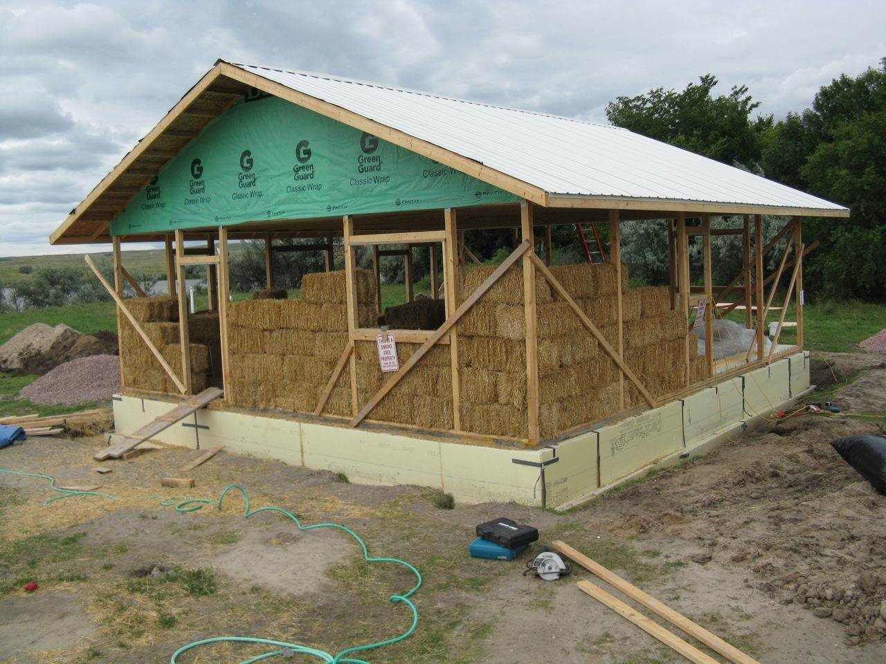 Straw bale house under construction.