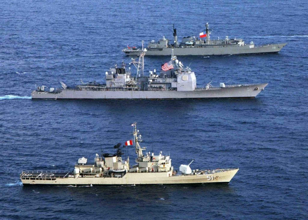 The Aegis Combat System at work (U.S Dept. of Defense photo)- The guided missile cruiser USS Thomas S. Gates (CG 51), center, underway alongside the Chilean frigate Williams (FF 19) and Peruvian frigate Carvajal (FM 51) in the Pacific Ocean (July 11, 2005). Thomas S. Gates is part of a multinational naval and coast guard force from six nations conducting UNITAS 46-05 Pacific Phase off the coasts of Colombia. During the two-week exercise, participating units have the opportunity to train as a unified force in all aspects of naval operations, from maritime interdiction to anti-submarine and electronic warfare. 