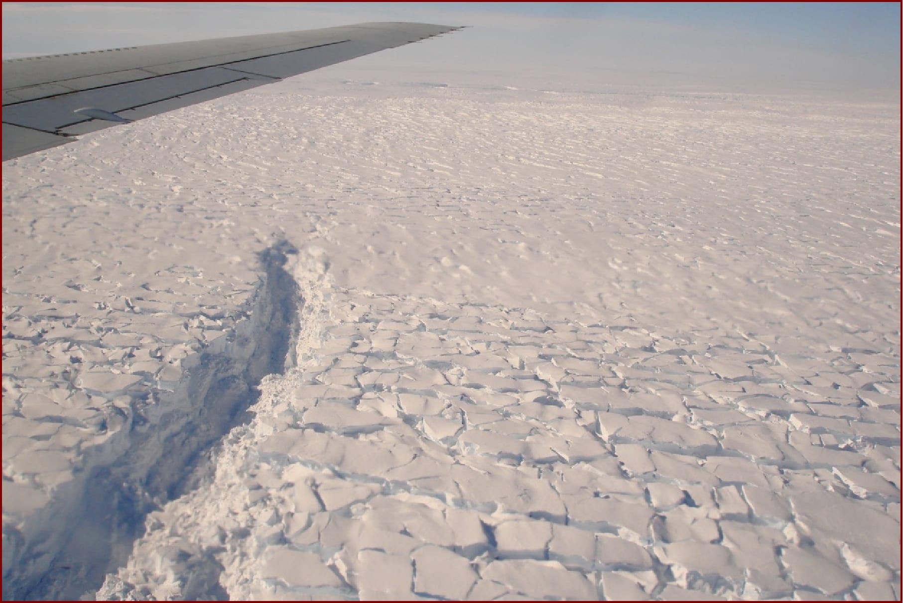Image of The rough surface of the ice in Antarctica as seen from the DC-8 aircraft in fall 2009. Credit: CReSIS