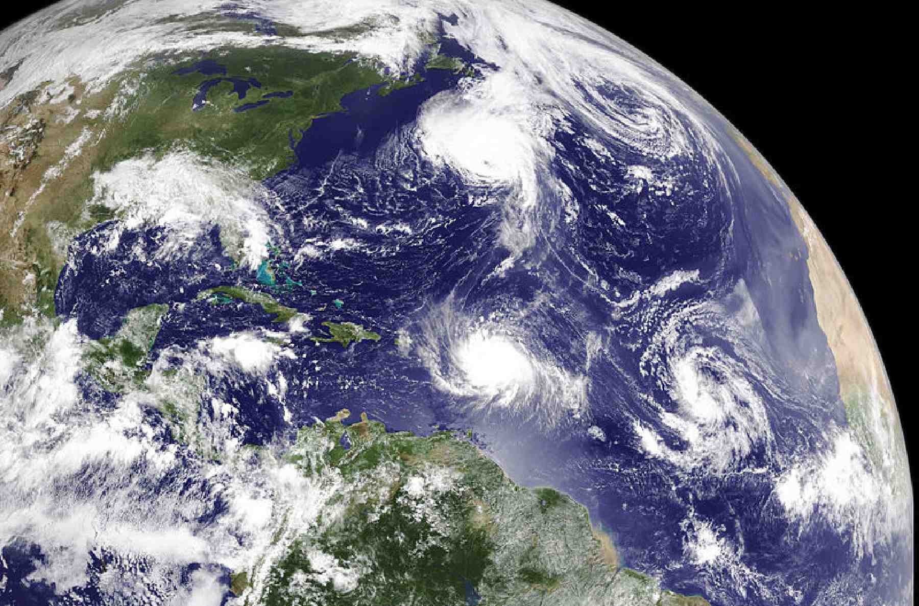 Figure 1. Synoptic satellite imagery of hurricane and tropical storm systems in the Atlantic Basin, 2010, showing hurricanes Earl (at center) and Fiona. (Source: NASA / NOAA, 2010)