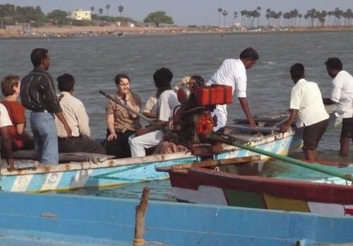 image of Volunteers working to clean up Pulicat Lake in India.  