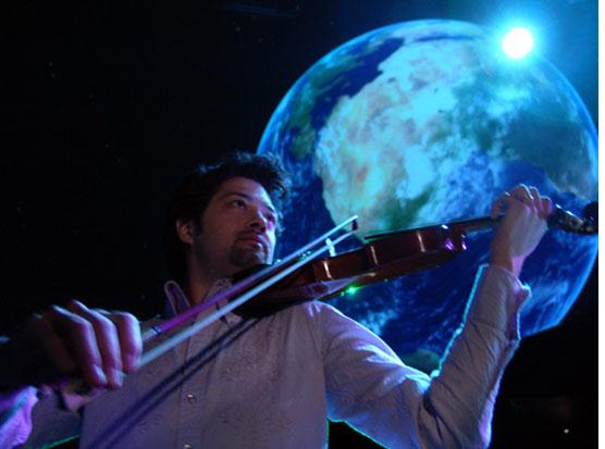 Kenji Williams performing the Bella Gaia show. Photo Source: Meaningful Media