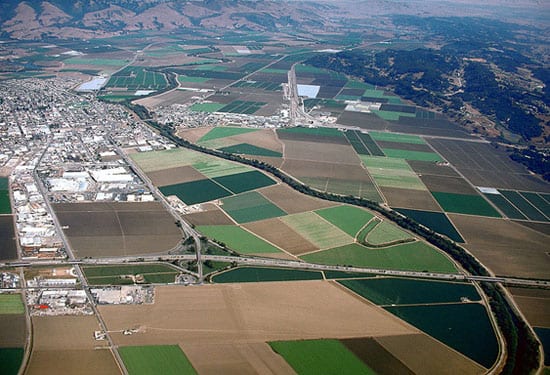 Aerial view of Watsonville, CA and the agricultural areas surrounding the town Public Domain US Army Corps of Engineers Digital Visual Library.