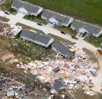 damaged homes. Steve Jahnke/The Southern Illinoisan, via Associated Press