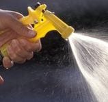 Image of a hose spraying water. Credit: Thinkstock