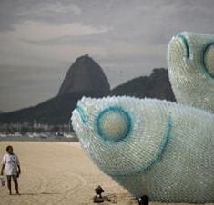 Photograph of model fish on the beach in Rio de Janeiro. No treaty covering the high seas will be agreed at Rio (Image: Christophe Simon/AFP/Getty Images)