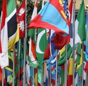 Photo of numerous nations' flags. Photograph: Johannes Simon/Getty Images
