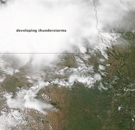 Image of thunderstorms forming over Kansas, USA. Credit: NASA Earth Observatory.