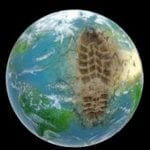 Image of the Earth with a footpring on it. Credit: Shutterstock.