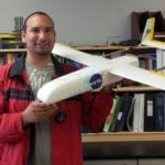 Francisco Pena with a 25-percent-scale Odyssey Uninhabited Aerial Vehicle. Image Credit: URC.