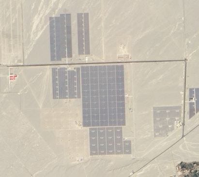 Satellite image of solar farms in Dunhuang. Credit:: NASA Earth Observatory