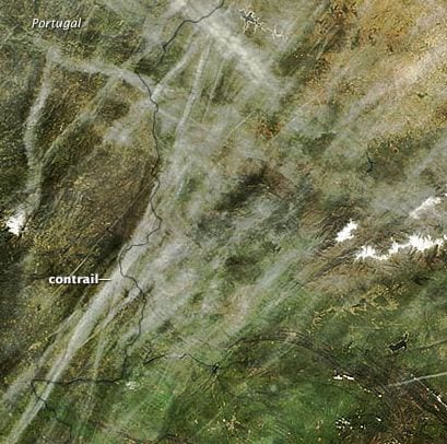 Photograph of contrails over portugal. Credit: NASA Earth Observatory