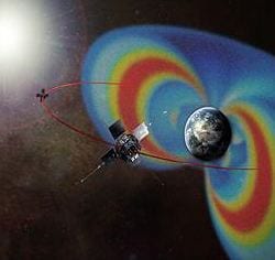 The tiny CREPT instrument will augment the science of NASA's Van Allen Probes, formerly known as the Radiation Belt Storm Probes. This artist's rendering of the Van Allen Probes mission shows the path of its two spacecraft through the radiation belts that surround Earth, which are made visible in false color. Credit: NASA.