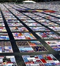 The AIDS Memorial Quilt, as it was unfurled on the Mall in 1992.A look at the history of AIDS in the U.S.: Robert Gallo and Luc Montagnier identified HIV — the virus that causes AIDS — in 1983.