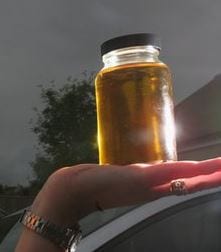 A picture of a jar of biofuel (recycled oil). Credit: Getty Images.