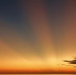 Crepuscular rays, sometimes called sunrays, via Rick Trommater.