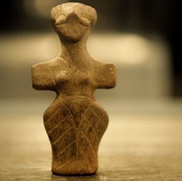 Photo of a small stone statue. Credit: AFP