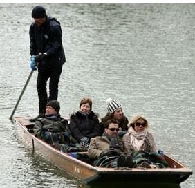 Punters wrap up warm as they make their way along the river Cam in Cambridge. Photograph: Chris Radburn/PA