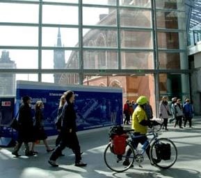 A cyclist pushes his bicycle through St Pancras station, London. Last week, Eurostar announced a revised cycle policy on its trains. Photograph: Julio Etchart/Alamy
