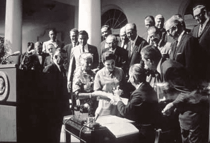President Lyndon B. Johnson signing the Wilderness Act, September 3, 1964. Image Credit Wikimedia Commons.