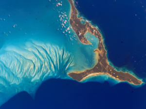 The south end of Eleuthera Island in the Bahamas shimmers in turquoise waters in this 2002 photo from the International Space Station. Image Credit: NASA.