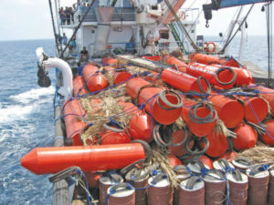 Fish aggregating devices can be made from anything and come in varying sizes. Many, like these anchored FADs, include palm fronds that hang over the edges of the FAD to attract fish. Image Credit: PNA Tuna