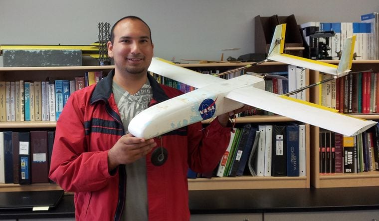Francisco Pena with a 25-percent-scale Odyssey Uninhabited Aerial Vehicle. Image Credit: URC.